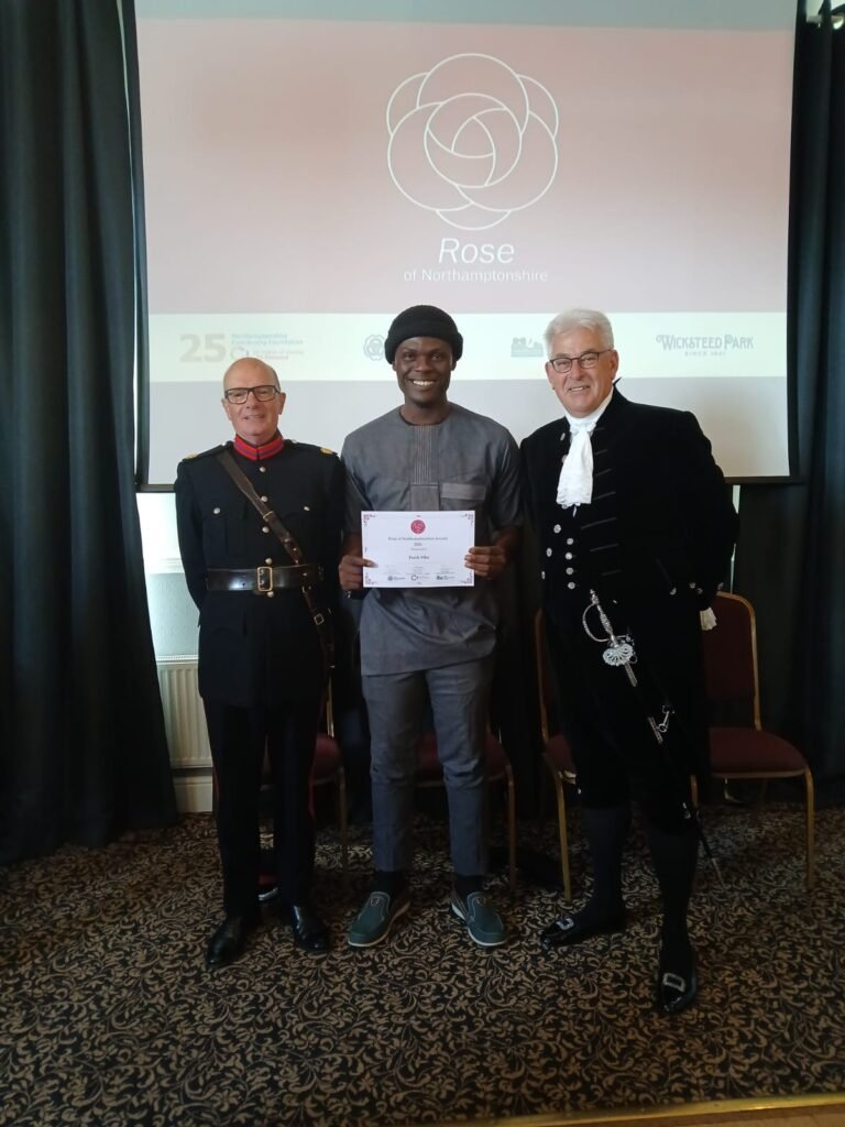 Frank Mba presented with a Rose of the Shires award